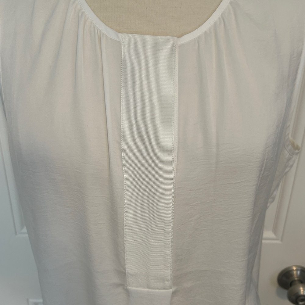 CAbi White snap blouse style #3864 size large Top longer length sleeveless layer